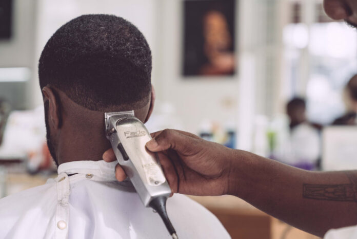 Barbershops and salons reopen in Georgia. Photo by Edgar Chaparro on Unsplash..