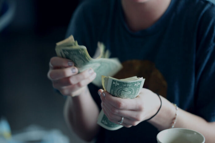 Preppers should use cash, photo by Sharon McCutcheon via Unsplash.