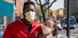 Couple wearing facemasks