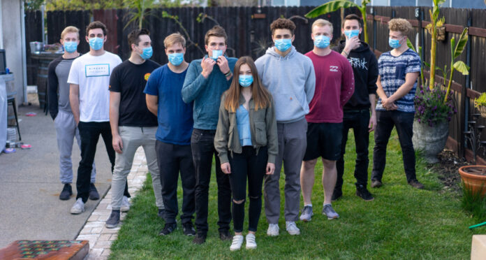 10 teens wearing masks. Photo by Clayton Cardinalli on Unsplash