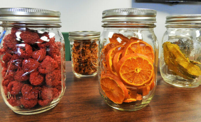 Dehydrated fruits in mason jars.