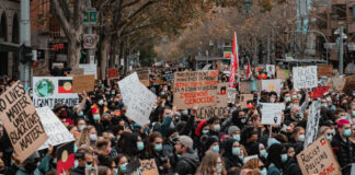 BLM protests fill the streets. Photo by Tony Zhen on Unsplash