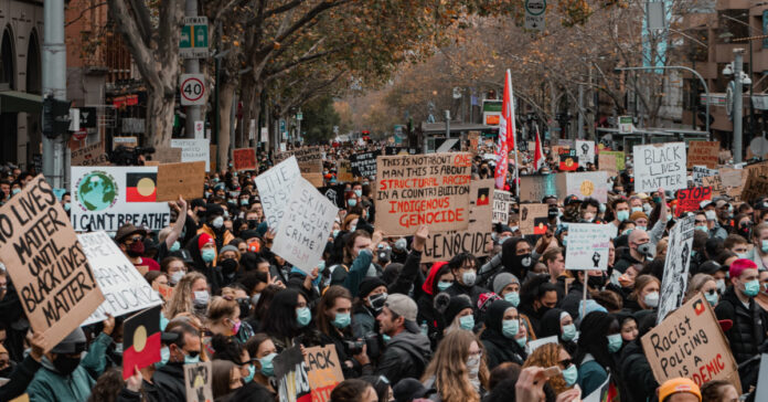 BLM protests fill the streets. Photo by Tony Zhen on Unsplash