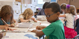 Students in an Atlanta classroom, one of the school districts that has announced it will begin the school year entirely online.