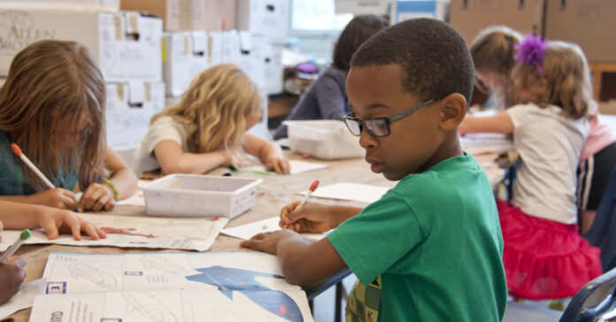 Students in an Atlanta classroom, one of the school districts that has announced it will begin the school year entirely online.