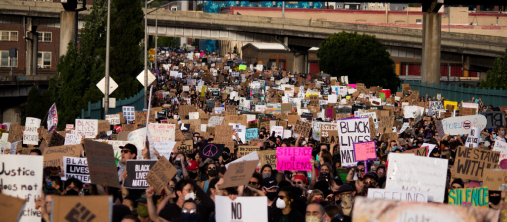 Protesters shut down a bridge in Portland.  Photo by Toto Texidor on Unsplash.