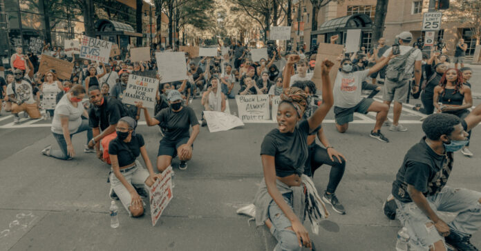 BLM protests in Charlotee. Photo by Clay Banks on Unsplash.