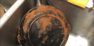 Rusty cast iron frying pan