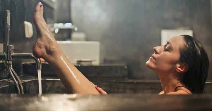 Woman bathing. Photo by bruce mars via Unsplash
