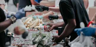 Food bank visitors. Photo by Joel Muniz on Unsplash