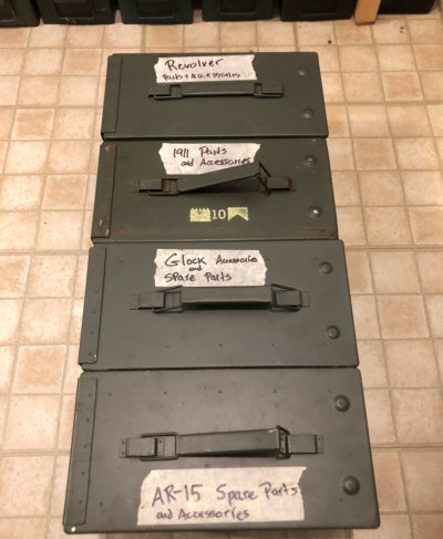 Gun parts stored in ammo cans