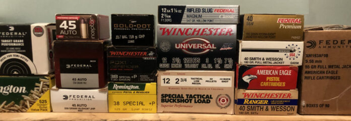 Stacks of different calibers and brands of ammunition