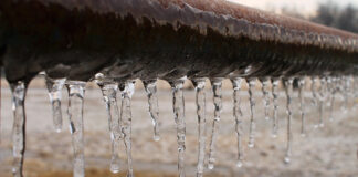 Ice hangs from a pipe