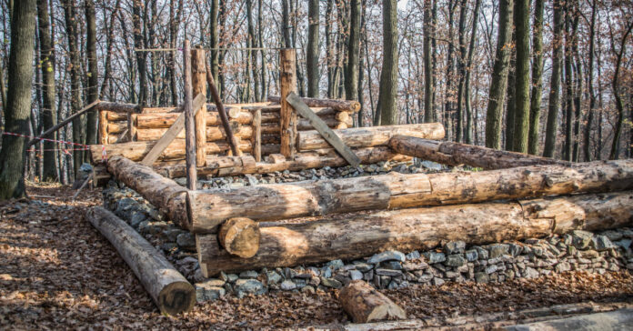 A log cabin under construction.