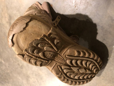 Eroded sole on a pair of boots.