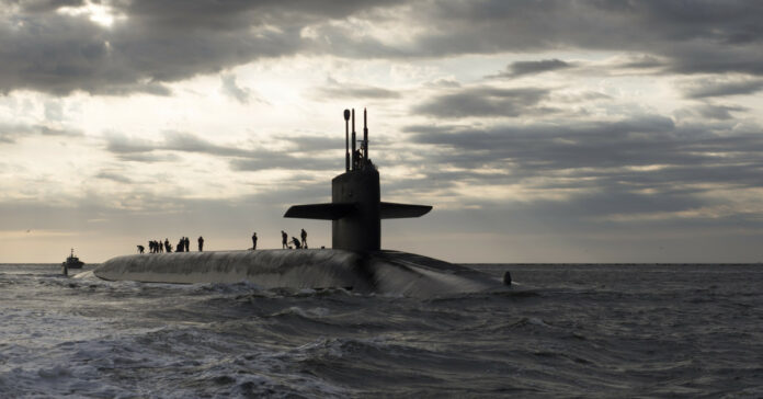 A submarine at sea. Image by David Mark from Pixabay.