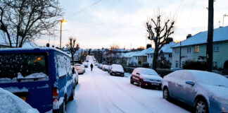 A London street covered in snow.