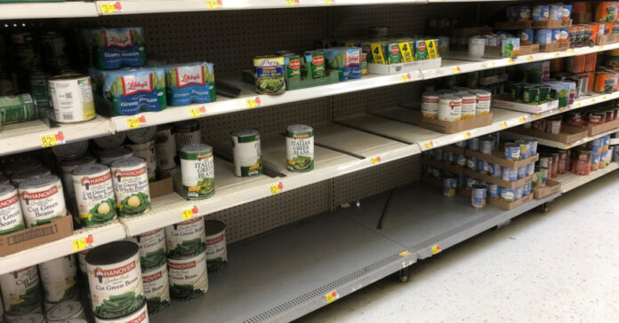 A partially empty shelf at Walmart
