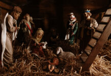 A Christmas nativity scene, Photo by Al Elmes on Unsplash.