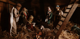 A Christmas nativity scene, Photo by Al Elmes on Unsplash.