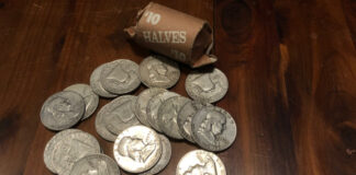 A roll of Franklin half-dollars that are 90 percent silver.