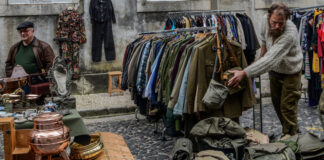 Used merchandise at a flea market. Photo by Alice Pasqual on Unsplash.