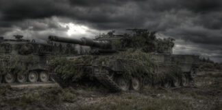 Two tanks under a cloudy sky