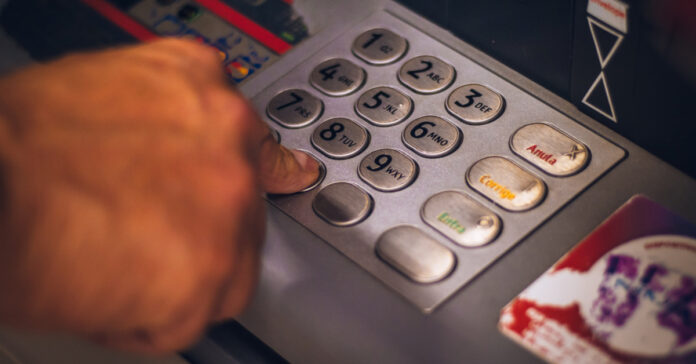Customer using an ATM