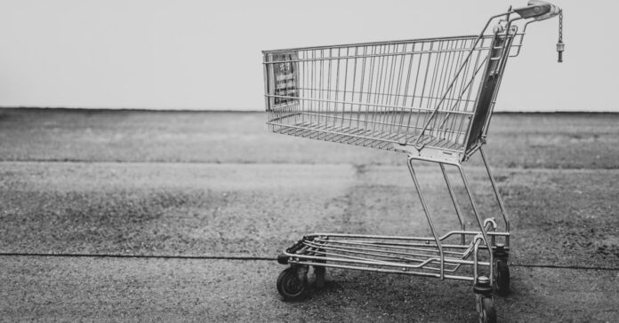 A forlorn shopping cart, representing food shortages.