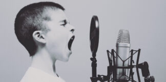 Yelling into a microphone