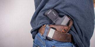 You can see how this inside-the-waistband holster and gun could be easily concealed by draping the shirt over it..