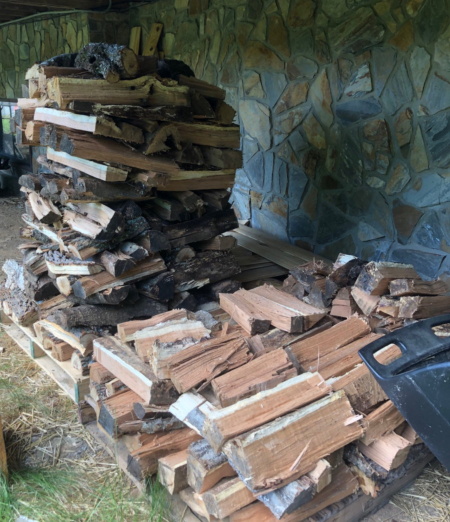 Spli firewood stacked to dry