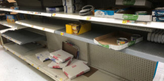 Decimated cat food shelves at Walmart