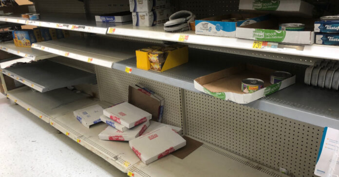 Decimated cat food shelves at Walmart