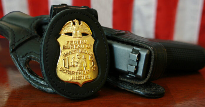 an FBI gun and badge