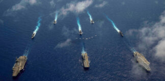 USS Ronald Reagan and USS Abraham Lincoln in the Philippine Sea in June.