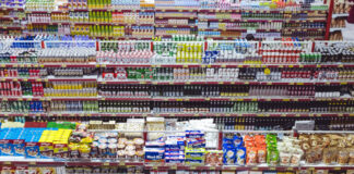 Store shelves crammed with food.