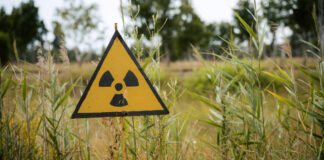 A radiation sign in a field
