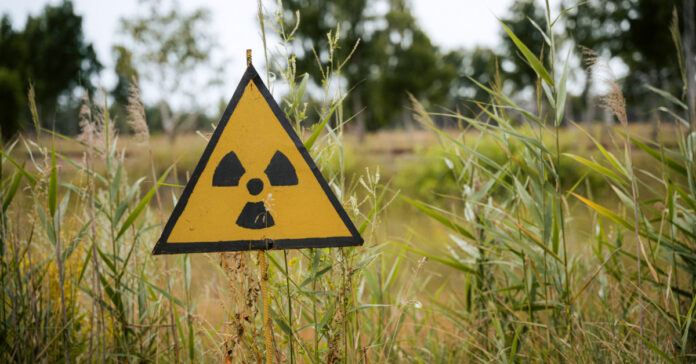 A radiation sign in a field