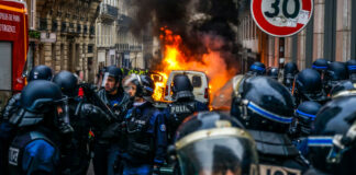 Rioters burn a van in France