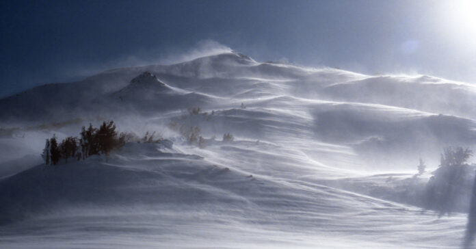 blowing snow on a mountain