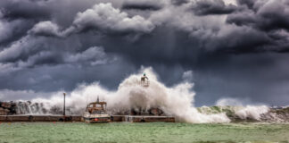 Storm-driven waves hit a dock.