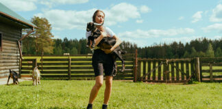 A homestead girl with goats