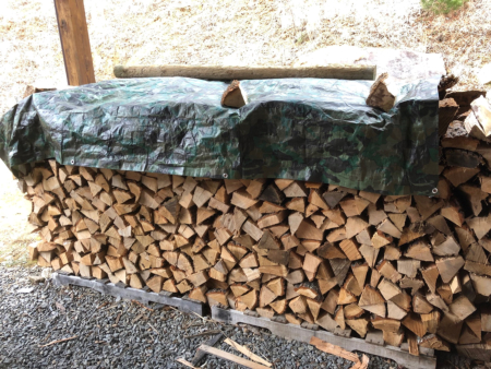 Tarp on a woodpile