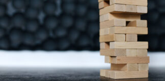 A pile of Jenga pieces in a tower.