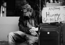 A homeless man who is hungry