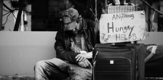A homeless man who is hungry