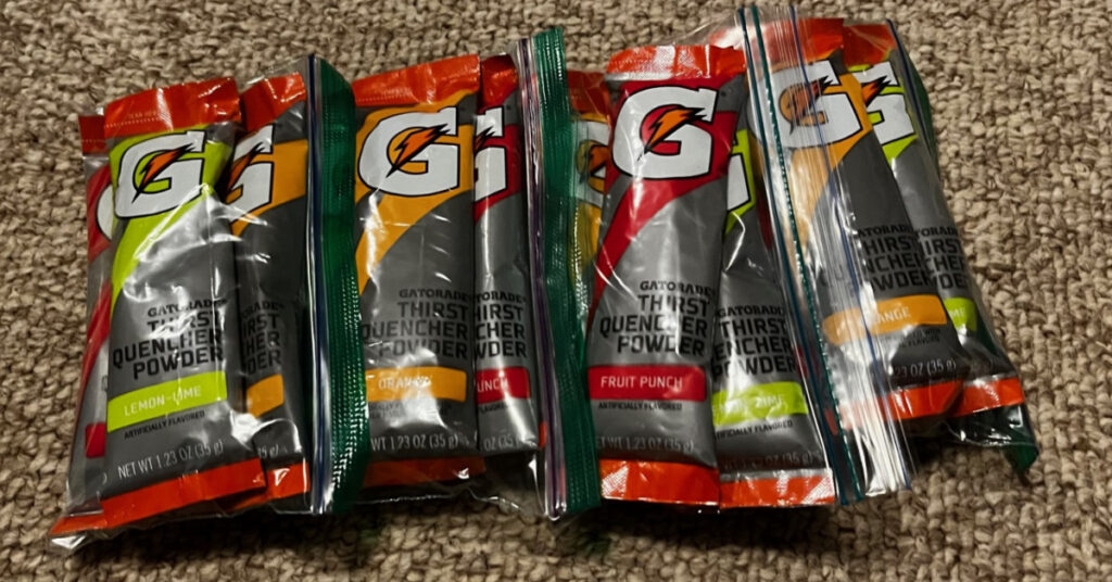 Three packets of Gatorade fit into the snack-sized plastic baggies. This adds less than four ounces to a bug out bag.