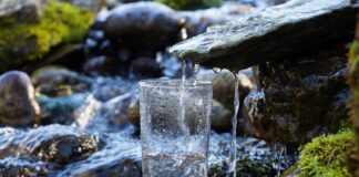 A waterfall filling a drinking glass