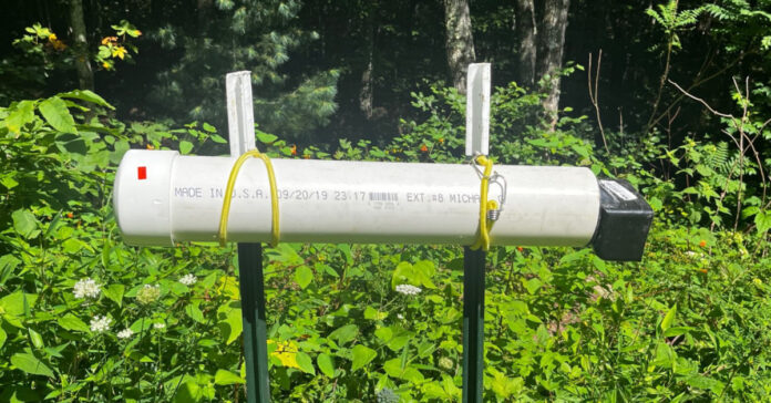 This homemade feeder is designed to allow bees to open feed on pollen substitute without letting it get rained on or blown away by heavy wind.